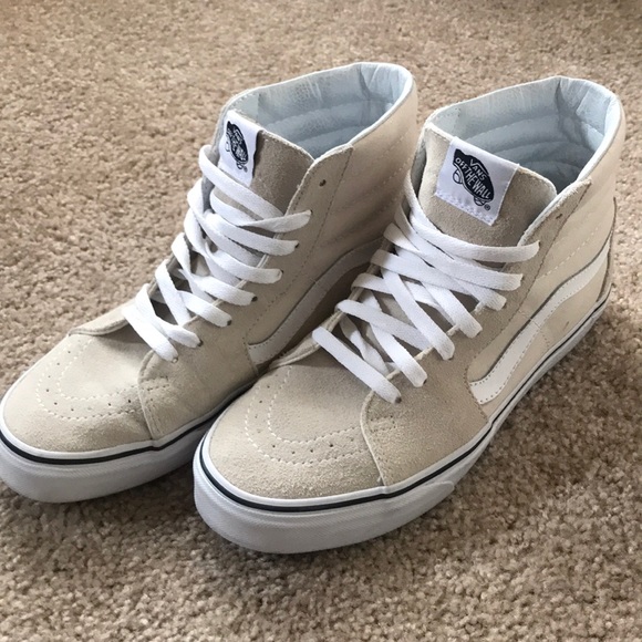 cream colored high top vans